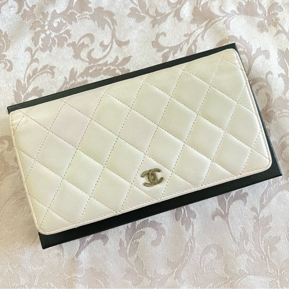 Authentic Chanel Lambskin Quilted Yen Wallet in Light Pink